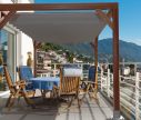 Seilspann Faltmarkise Premium Grau auf der Pergola - Window2Print